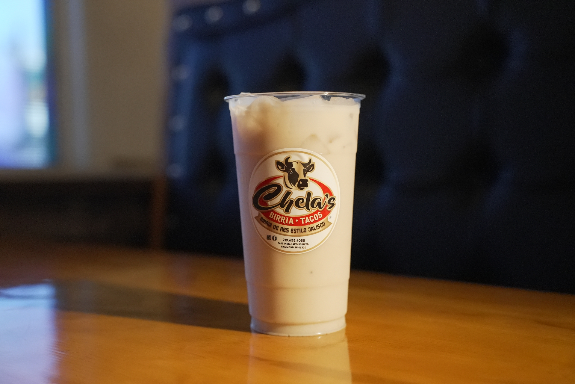 Creamy horchata served at Chela's Birria Tacos